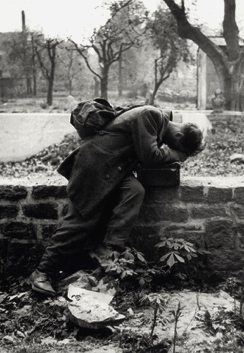 A German soldier returns home only to find his family no longer there. Frankfurt, 1946 - by Tony Vaccaro