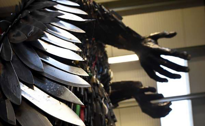 This Sculpture is Made of 100,000 Knives Confiscated by Police 3 giant knife angel sculpture alfie radley 3